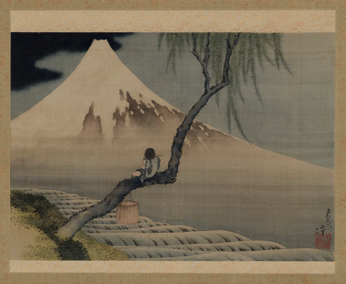 A boy holding a flute sits on a willow branch above rooftops and looks toward Mount Fuji.