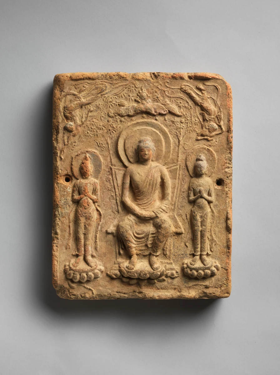 Tile with a Buddha triad. Second half of the 7th century.